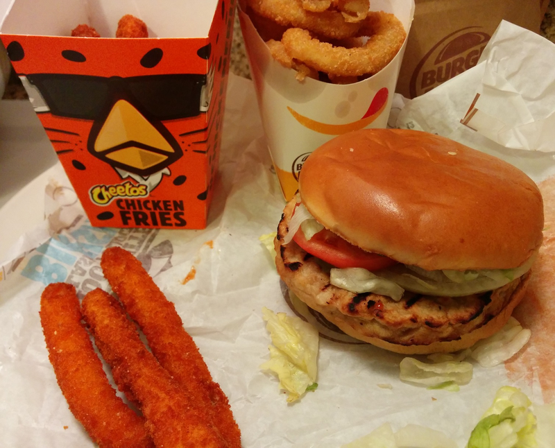 Illustration for article titled SnackTAYku: It's Not Easy Being Cheesy & Chicken but Burger King's Cheetos Chicken Fries Make It Work